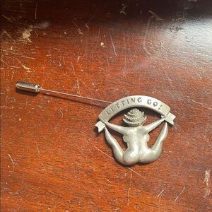 Vintage Silver-tone 'Letting Go' Figure hat Pin